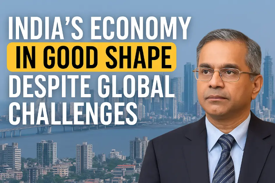 A news graphic showing India's positive economic outlook with a confident Chief Economic Advisor, a digital chart displaying rising growth trends, and a backdrop of India's national colors symbolizing resilience amid global uncertainty.